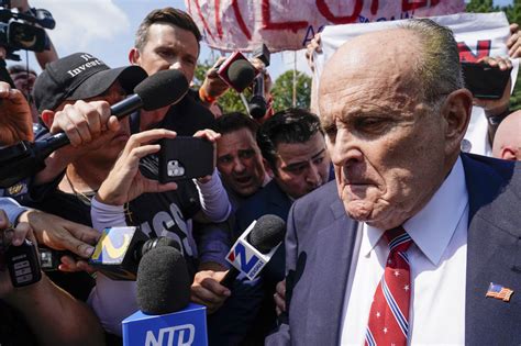 Rudy Giuliani pleads not guilty to charges in Georgia election case